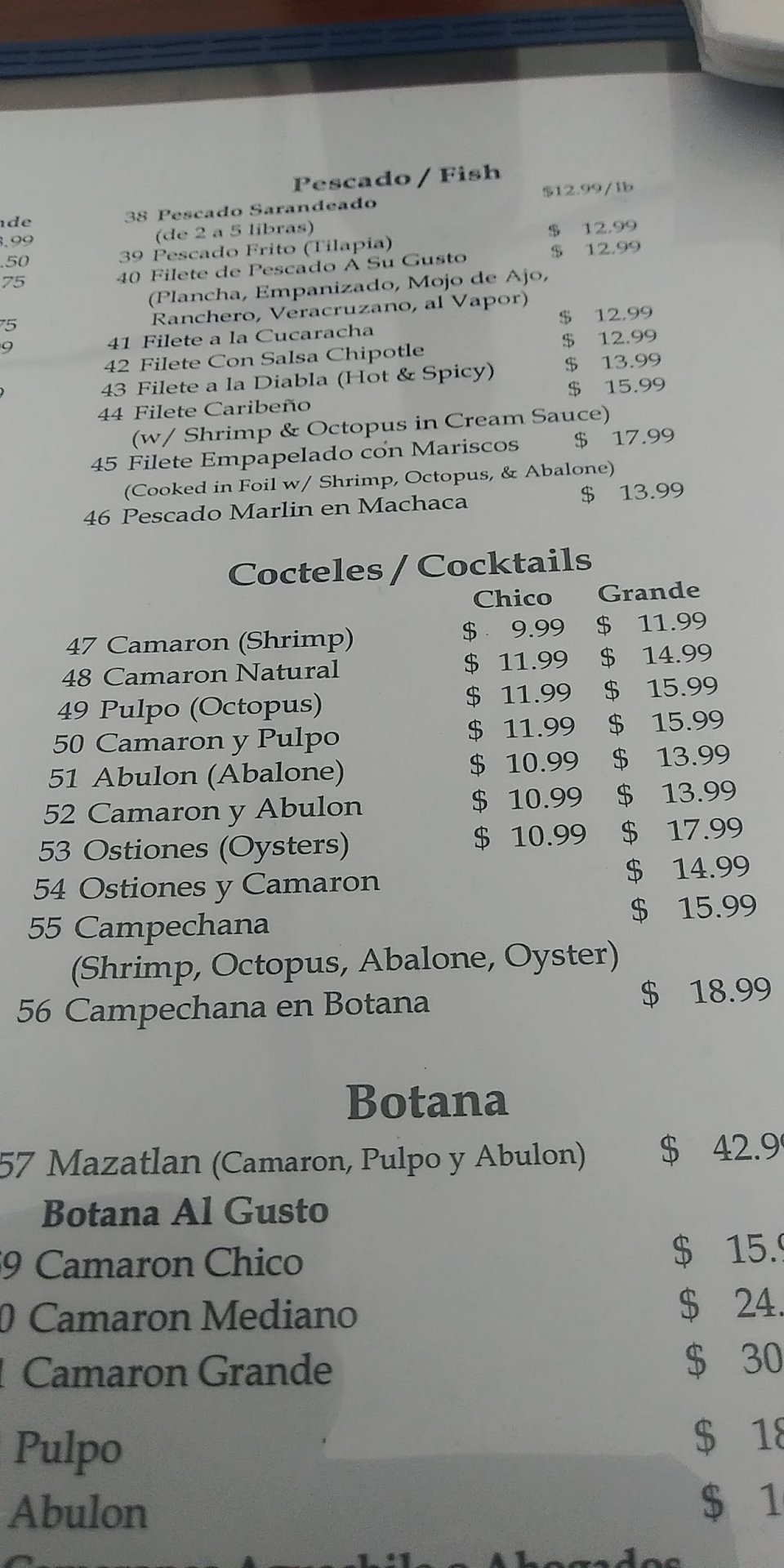 Beverage menu showing micheladas and sodas.
